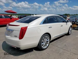 2013 Cadillac XTS Luxury with VIN 2G61P5S30D9149947, listed as a Copart auction lot 64482355 with 137,760 mi miles and Salvage title. Bid and sale history available at DreamBid. Image 3.