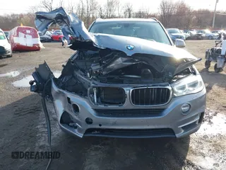2014 BMW X5 xDrive35i z VIN 5UXKR0C52E0H19670, wystawiony jako IAAI lot #41909590 z przebiegiem 137 758 mil mil oraz . Historia ofert i sprzedaży dostępna na DreamBid. Obrazek 17.