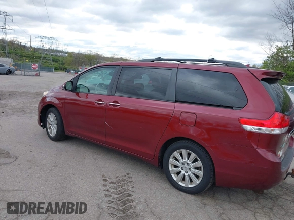 2013 Toyota Sienna XLE with VIN 5TDDK3DC1DS052600, listed as a IAAI auction lot 42055747 with 187,615 mi miles and . Bid and sale history available at DreamBid. Image 3.
