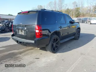 2014 Chevrolet Tahoe LT with VIN 1GNSCBE0XER202150, listed as a IAAI auction lot 41922771 with 168,693 mi miles and . Bid and sale history available at DreamBid. Image 4.