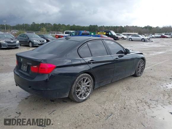 2015 BMW 3 Series 328i with VIN WBA3A5G55FNS82637, listed as a IAAI auction lot 41815354 with 126,054 mi miles and . Bid and sale history available at DreamBid. Image 4.