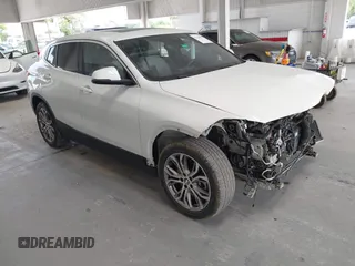 2022 BMW X2 sDrive28i z VIN WBXYH9C08N5U29086, wystawiony jako IAAI lot #42119627 z przebiegiem 76 364 mil mil oraz . Historia ofert i sprzedaży dostępna na DreamBid. Obrazek 1.