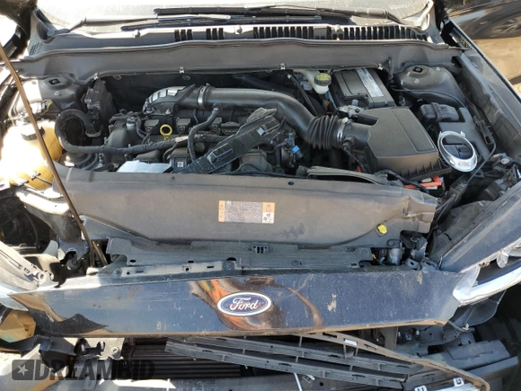 2016 Ford Fusion Titanium z VIN 3FA6P0K98GR151640, wystawiony jako Copart lot #73254594 z przebiegiem 145 473 mil mil oraz Szkoda całkowita • Salvage title. Historia ofert i sprzedaży dostępna na DreamBid. Obrazek 12.