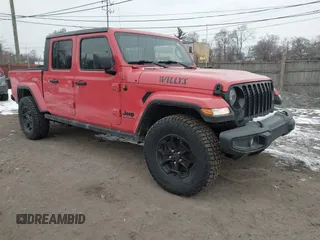 2021 Jeep Gladiator Willys with VIN 1C6HJTAG6ML550649, listed as a IAAI auction lot 41530585 with 119,002 mi miles and . Bid and sale history available at DreamBid. Image 1.