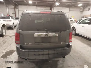 2012 Honda Pilot Touring with VIN 5FNYF4H98CB030879, listed as a IAAI auction lot 41619003 with 201,131 mi miles. Bid and sale history available at carsss.com. Image 16.