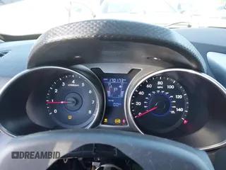2013 Hyundai Veloster w/Black Int with VIN KMHTC6AD5DU116443, listed as a IAAI auction lot 41635858 with 170,173 mi miles and . Bid and sale history available at DreamBid. Image 7.