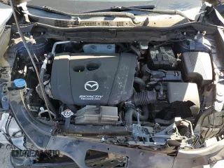 2015 Mazda CX-5 Sport with VIN JM3KE2BEXF0483141, listed as a Copart auction lot 59134105 with 71,727 mi miles and Salvage title. Bid and sale history available at DreamBid. Image 12.