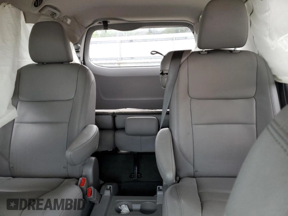 2015 Toyota Sienna XLE с VIN 5TDYK3DC2FS565567, выставлен на аукционе Copart как лот 51822235 с пробегом Не указан миль и Списание • Salvage title. История ставок и продаж доступна на DreamBid. Изображение 10.