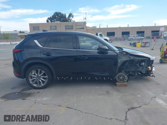2021 Mazda CX-5 Grand Touring with VIN JM3KFBDM4M1426197, listed as a IAAI auction lot 42004644 with 43,814 mi miles. Bid and sale history available at carsss.com. Image 14.