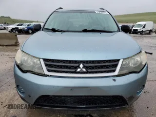 2007 Mitsubishi Outlander LS z VIN JA4MT31XX7Z016180, wystawiony jako Copart lot #59299615 z przebiegiem 125 060 mil mil oraz Szkoda całkowita • Salvage title. Historia ofert i sprzedaży dostępna na DreamBid. Obrazek 5.