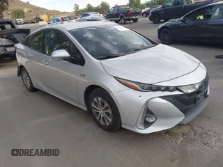 2017 Toyota Prius Plus with VIN JTDKARFP6H3039054, listed as a IAAI auction lot 41665195 with 233,161 mi miles and . Bid and sale history available at DreamBid. Image 1.