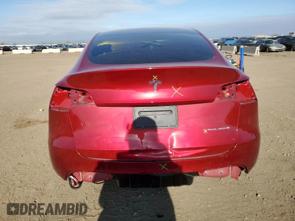 2024 Tesla Model Y Long Range with VIN 7SAYGDEE4RA257722, listed as a Copart auction lot 54577865 with 10,713 mi miles and Salvage Title. Bid and sale history available at DreamBid. Image 6.
