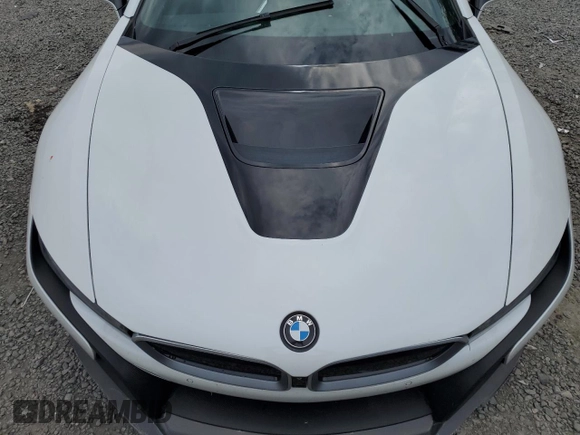 2015 BMW i8 z VIN WBY2Z2C56FV392042, wystawiony jako Copart lot #66972874 z przebiegiem Nie podano mil oraz Szkoda całkowita • Salvage title. Historia ofert i sprzedaży dostępna na DreamBid. Obrazek 11.