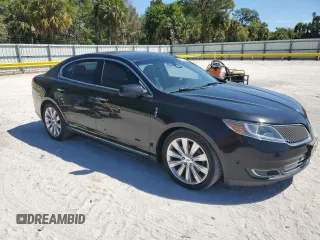 2013 Lincoln MKS EcoBoost with VIN 1LNHL9FT8DG603948, listed as a Copart auction lot 49908455 with 133,493 mi miles and Salvage title. Bid and sale history available at DreamBid. Image 4.