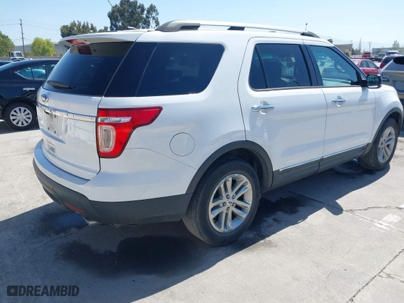 2015 Ford Explorer XLT with VIN 1FM5K7D84FGA69715, listed as a IAAI auction lot 42088159 with 167,715 mi miles. Bid and sale history available at carsss.com. Image 4.