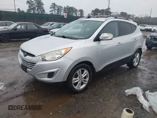 2011 Hyundai Tucson Limited with VIN KM8JUCAC9BU200367, listed as a IAAI auction lot 41867617 with 228,456 mi miles and . Bid and sale history available at DreamBid. Image 2.