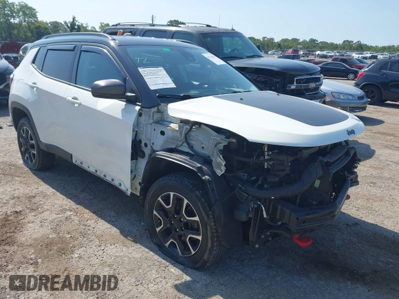 2021 Jeep Compass Trailhawk with VIN 3C4NJDDB7MT564467, listed as a IAAI auction lot 42330939 with 76,963 mi miles and . Bid and sale history available at DreamBid. Image 1.