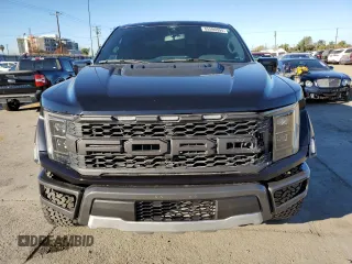 2021 Ford F-150 Raptor with VIN 1FTFW1RG3MFC62242, listed as a Copart auction lot 85596594 with 33,497 mi miles and Salvage Title. Bid and sale history available at carsss.com. Image 5.