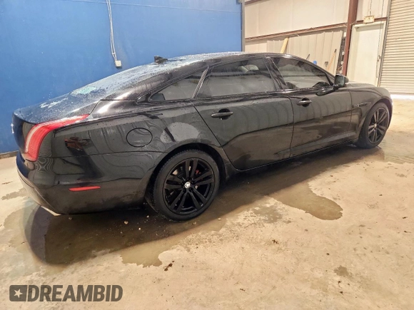 2013 Jaguar XJ Portfolio with VIN SAJWA2GB4DLV51516, listed as a Copart auction lot 60646925 with 141,309 mi miles and Clean title. Bid and sale history available at DreamBid. Image 3.
