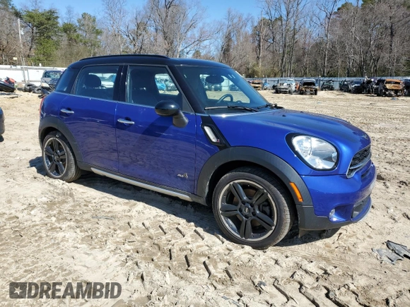 2016 MINI Countryman S with VIN WMWZC5C56GWP49473, listed as a Copart auction lot 50752355 with 118,060 mi miles and Salvage Title. Bid and sale history available at DreamBid. Image 4.