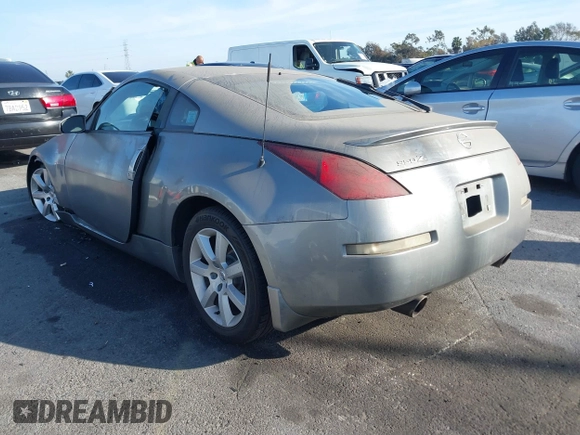 2004 Nissan 350Z Touring with VIN JN1AZ34E84T060682, listed as a IAAI auction lot 41616199 with 209,814 mi miles. Bid and sale history available at carsss.com. Image 3.