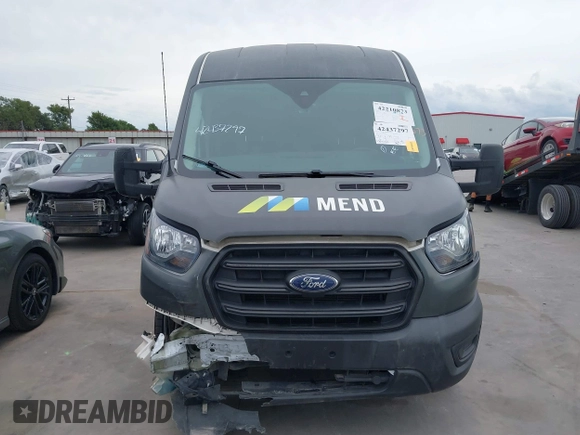 2020 Ford Transit Cargo z VIN 1FTBR1C82LKB46155, wystawiony jako IAAI lot #42437297 z przebiegiem 75 040 mil mil oraz . Historia ofert i sprzedaży dostępna na DreamBid. Obrazek 13.