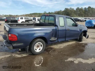 2003 Ford F-150 XL with VIN 1FTRX07273KB66549, listed as a Copart auction lot 83552004 with 205,026 mi miles and Salvage Title. Bid and sale history available at carsss.com. Image 3.