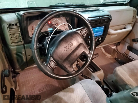 2003 Jeep Wrangler Rubicon z VIN 1J4FA69S13P345591, wystawiony jako Copart lot #41741685 z przebiegiem 85 335 mil mil oraz Szkoda całkowita • Salvage title. Historia ofert i sprzedaży dostępna na DreamBid. Obrazek 8.