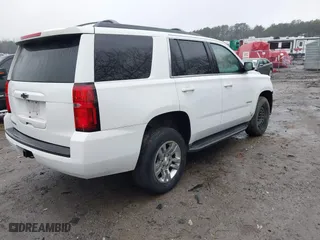 2017 Chevrolet Tahoe LS with VIN 1GNSCAKC3HR265961, listed as a IAAI auction lot 41426651 with 117,331 mi miles. Bid and sale history available at carsss.com. Image 4.