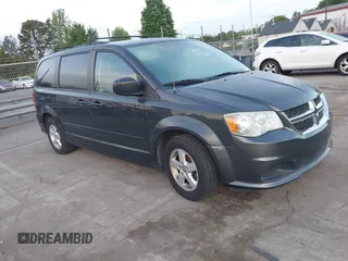 2012 Dodge Grand Caravan SXT with VIN 2C4RDGCG1CR141019, listed as a IAAI auction lot 42088541 with 148,931 mi miles and . Bid and sale history available at DreamBid. Image 1.