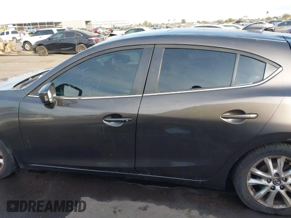 2015 Mazda 3 i Touring with VIN 3MZBM1L74FM236410, listed as a IAAI auction lot 41339253 with 119,731 mi miles and . Bid and sale history available at DreamBid. Image 13.