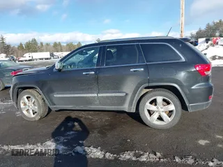 2013 Jeep Grand Cherokee Overland with VIN 1C4RJFCT3DC636378, listed as a IAAI auction lot 41477415 with 147,651 mi miles. Bid and sale history available at carsss.com. Image 14.