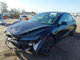 2025 Tesla Model 3 Long Range with VIN 5YJ3E1EB3SF926394, listed as a IAAI auction lot 42249844 with 1,090 mi miles and . Bid and sale history available at DreamBid. Image 2.