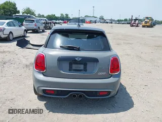 2019 MINI Hardtop 4 Door Cooper S with VIN WMWXU3C57K2H54547, listed as a IAAI auction lot 42492037 with 74,657 mi miles and . Bid and sale history available at DreamBid. Image 17.