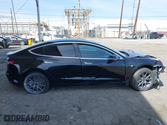 2019 Tesla Model 3 Mid Range with VIN 5YJ3E1EA1KF410297, listed as a IAAI auction lot 41841991 with 176,254 mi miles. Bid and sale history available at carsss.com. Image 13.