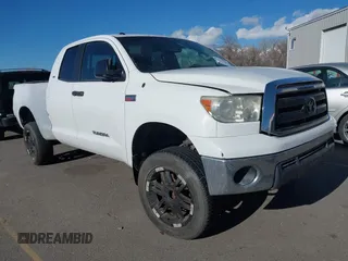 2010 Toyota Tundra z VIN 5TFUW5F16AX102070, wystawiony jako IAAI lot #41603206 z przebiegiem 214 742 mil mil oraz . Historia ofert i sprzedaży dostępna na DreamBid. Obrazek 1.