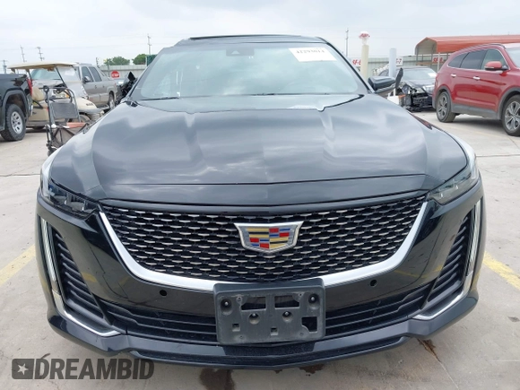 2023 Cadillac CT5 Premium Luxury z VIN 1G6DN5RK7P0119990, wystawiony jako IAAI lot #42293014 z przebiegiem 44 690 mil mil oraz . Historia ofert i sprzedaży dostępna na DreamBid. Obrazek 13.