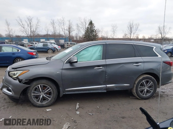 2019 Infiniti QX60 LUXE with VIN 5N1DL0MN4KC528751, listed as a IAAI auction lot 41076594 with 120,452 mi miles. Bid and sale history available at carsss.com. Image 14.