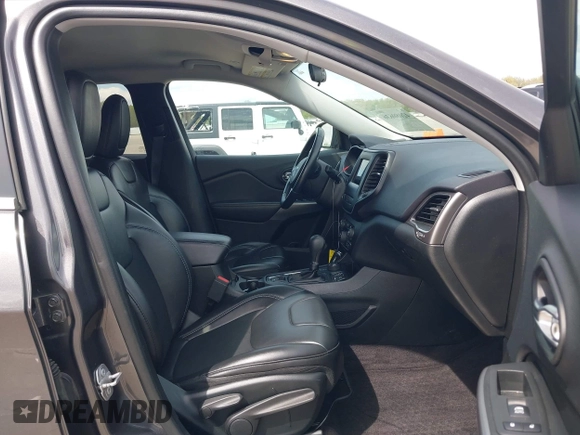 2019 Jeep Cherokee Latitude Plus with VIN 1C4PJMLB4KD139544, listed as a IAAI auction lot 42080636 with 76,715 mi miles and . Bid and sale history available at DreamBid. Image 5.