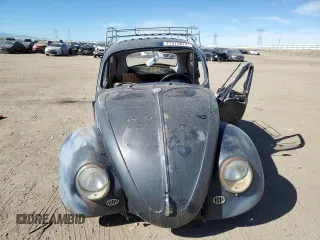1967 Volkswagen Beetle with VIN 117141737, listed as a Copart auction lot 77373074 with 22,424 mi miles and Salvage Title. Bid and sale history available at DreamBid. Image 5.