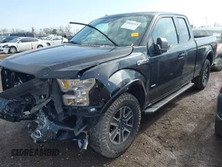 2015 Ford F-150 XLT with VIN 1FTEX1EP1FFC73368, listed as a IAAI auction lot 42036914 with 114,916 mi miles. Bid and sale history available at carsss.com. Image 2.
