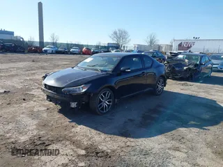 2014 Scion tC with VIN JTKJF5C78E3074094, listed as a IAAI auction lot 41828785 with 164,976 mi miles. Bid and sale history available at carsss.com. Image 18.