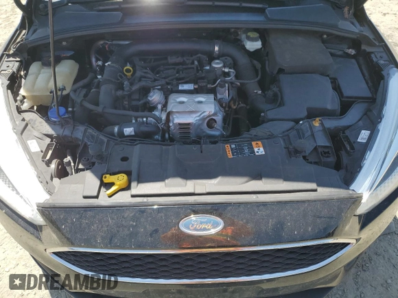 2018 Ford Focus SE with VIN 1FADP3FE8JL205699, listed as a Copart auction lot 63300795 with 128,877 mi miles and Clean title. Bid and sale history available at DreamBid. Image 11.