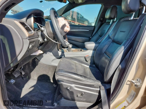 2015 Jeep Grand Cherokee Summit with VIN 1C4RJEJG9FC952192, listed as a Copart auction lot 63714045 with 147,732 mi miles and Salvage title. Bid and sale history available at DreamBid. Image 7.