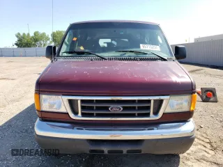 2004 Ford Econoline Passenger XL with VIN 1FBSS31LX4HB16895, listed as a Copart auction lot 65115554 with 48,980 mi miles and Salvage Title. Bid and sale history available at carsss.com. Image 5.