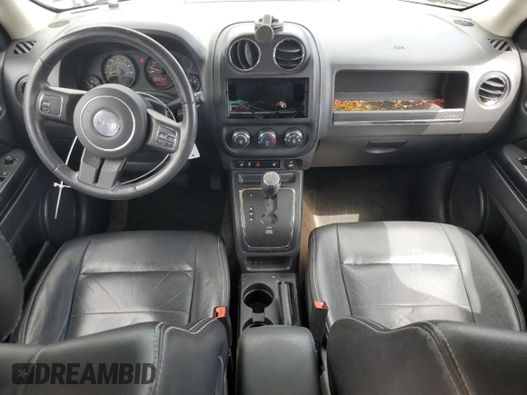 2015 Jeep Patriot High Altitude with VIN 1C4NJRFB9FD258471, listed as a Copart auction lot 54759735 with 127,823 mi miles and Salvage title. Bid and sale history available at DreamBid. Image 8.