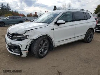 2020 Volkswagen Tiguan SEL Premium R-Line with VIN 3VV4B7AX8LM033024, listed as a Copart auction lot 77354494 with 127,247 mi miles and Salvage Title. Bid and sale history available at carsss.com. Image 1.