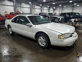 1997 Ford Thunderbird LX with VIN 1FALP6249VH167869, listed as a Copart auction lot 86851434 with 40,490 mi miles and Salvage Title. Bid and sale history available at DreamBid. Image 4.