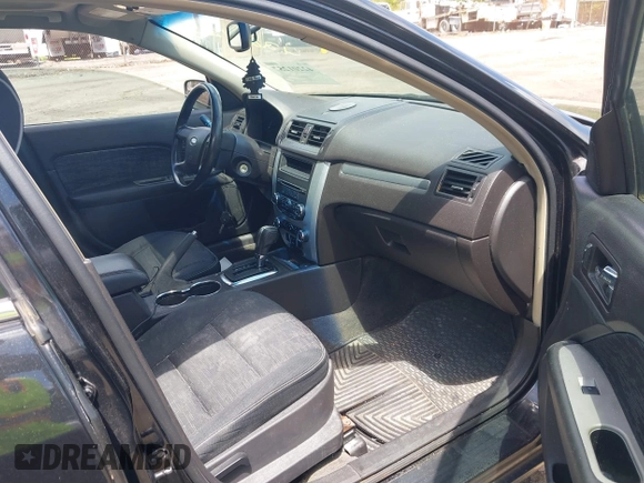 2011 Ford Fusion SE with VIN 3FAHP0HA0BR265182, listed as a IAAI auction lot 42201257 with 144,718 mi miles and . Bid and sale history available at carsss.com. Image 5.