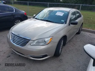 2014 Chrysler 200 LX with VIN 1C3CCBAB3EN123855, listed as a IAAI auction lot 41573962 with 146,495 mi miles and . Bid and sale history available at carsss.com. Image 2.